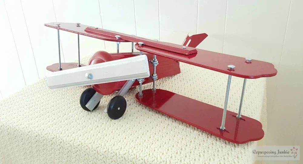 22 Build decorative airplane from repurposed ceiling fan blades, side view 2, by Repurposing Junkie featured on @Bekob