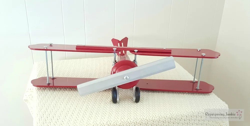 15 Build decorative airplane from repurposed ceiling fan blades, front view 1, by Repurposing Junkie featured on @Bekob