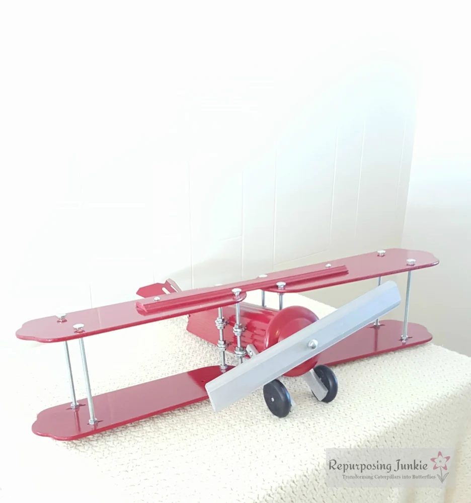 18 Build decorative airplane from repurposed ceiling fan blades, front view 4, by Repurposing Junkie featured on @Bekob