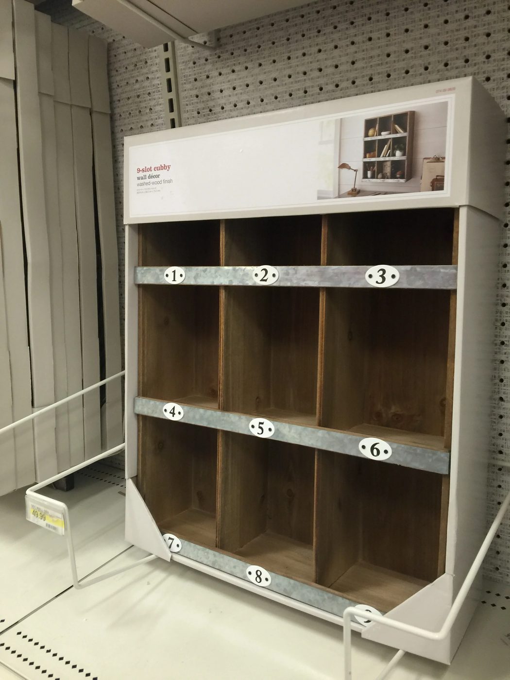You COULD buy it at Target for around $50... or you could build it in a day for around $12. This rustic wood and metal Handmade cubby shelf is straightforward to put together and S