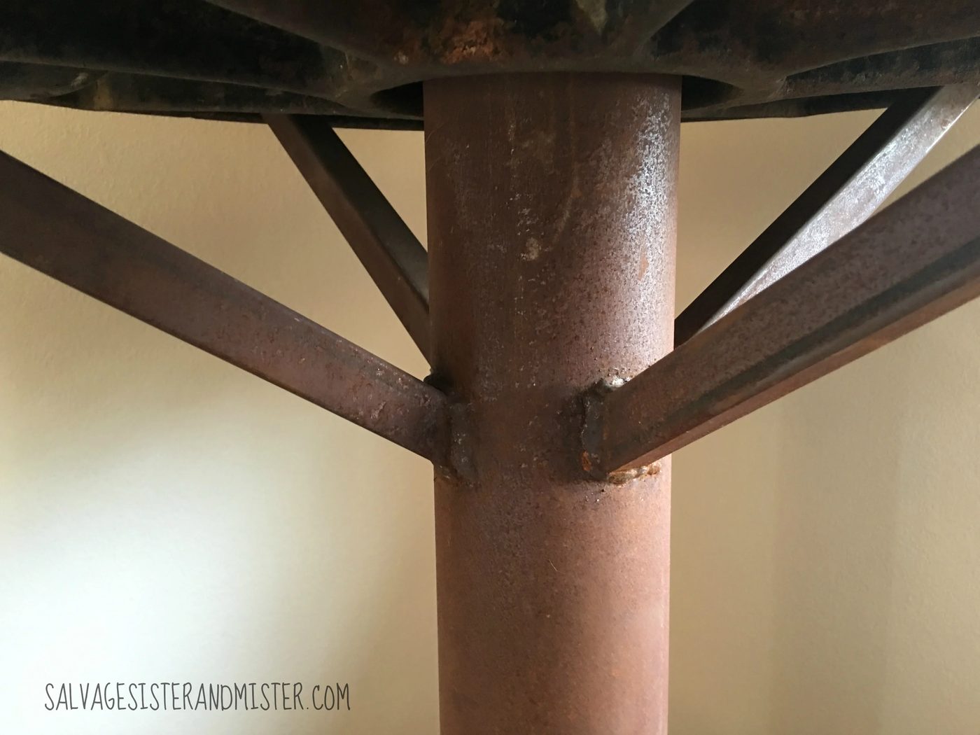 Welded posts add stability to industrial bar table built of salvaged junk by Salvage Sister and Mister featured on @Bekob