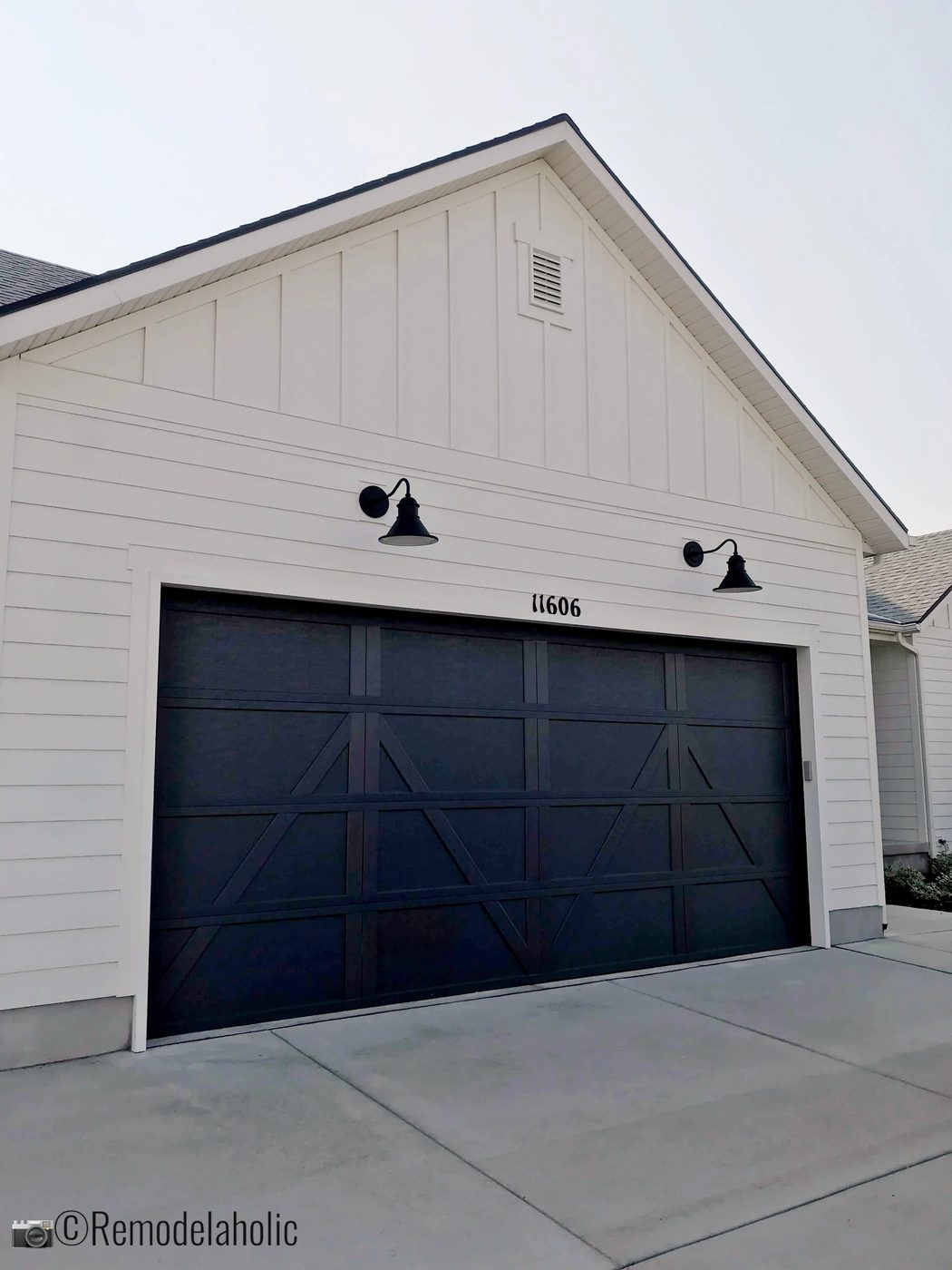 Barn lighting for a garage, SLPH 2018 Home 7 Wright Homes, Photo by Bekob