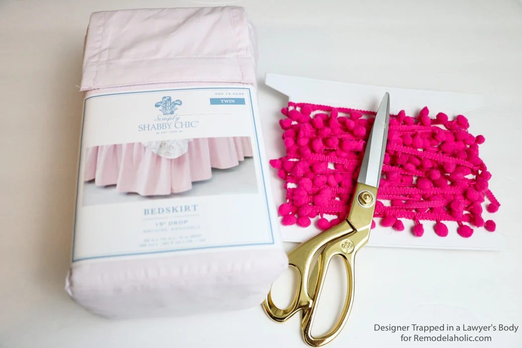Embellished bed skirts are expensive! If you are on a modest-cost, create this semi-homemade pom pom bedskirt without breaking the bank. It's a high-end look on a modest-cost!
