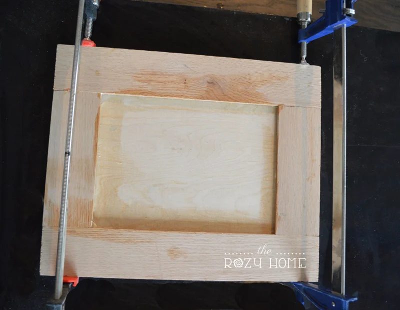 Clamp the cabinet door.
