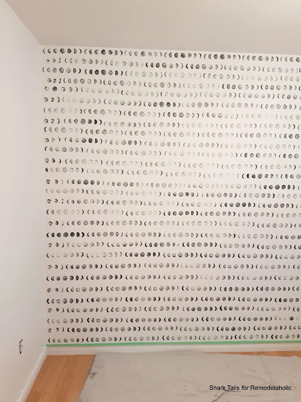 Handmade lunar cycle stamped accent wall for a gender neutral baby nursery | Paint this entire wall in one day and save hundreds of dollars over buying hand-painted wallpaper