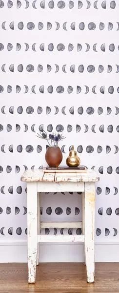 Handmade lunar cycle stamped accent wall for a gender neutral baby nursery | Paint this entire wall in one day and save hundreds of dollars over buying hand-painted wallpaper
