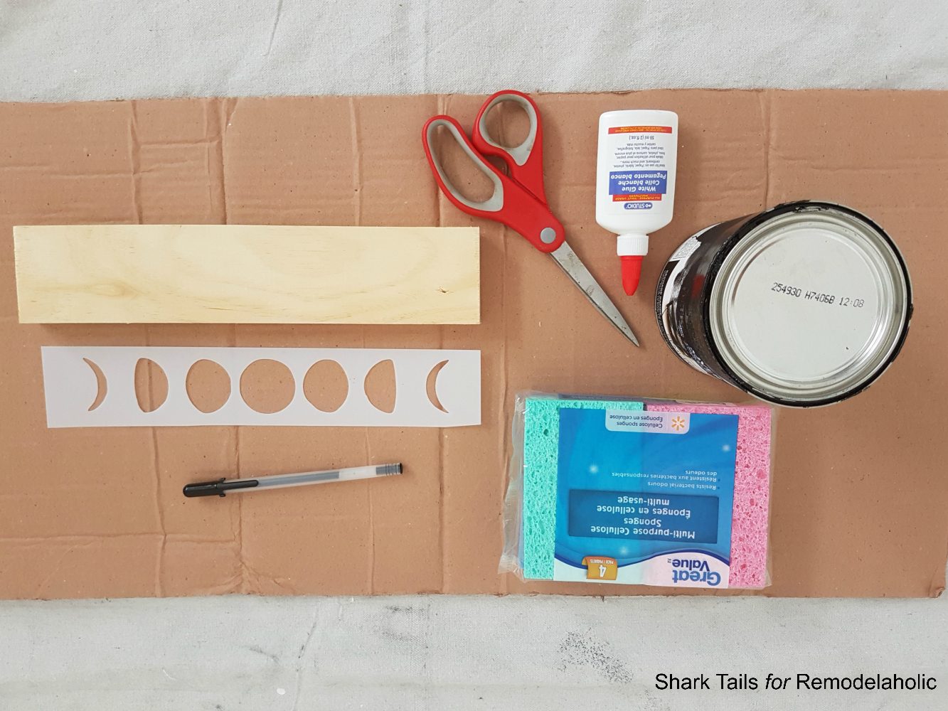 Handmade lunar cycle stamped accent wall for a gender neutral baby nursery | Paint this entire wall in one day and save hundreds of dollars over buying hand-painted wallpaper