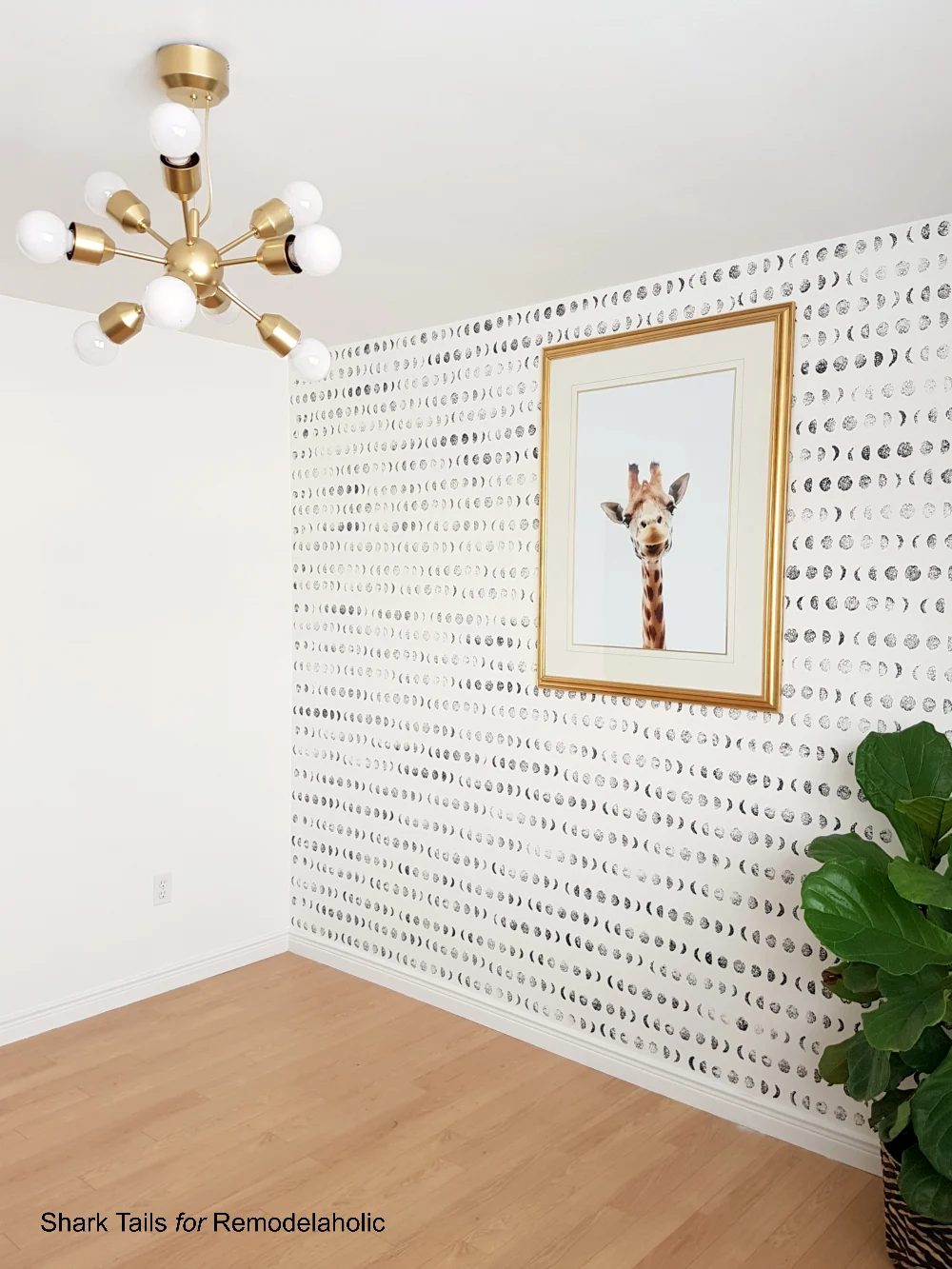 Handmade lunar cycle stamped accent wall for a gender neutral baby nursery | Paint this entire wall in one day and save hundreds of dollars over buying hand-painted wallpaper