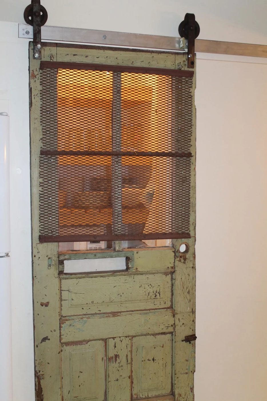 pantry barn door from vintage door and meat hooks, Girl Meets Carpenter on @Bekob