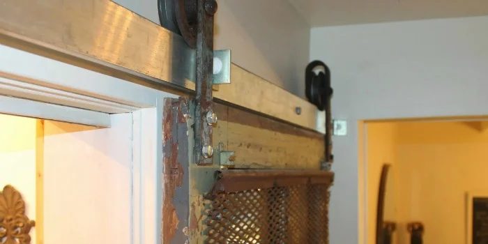 Sliding Barn Door Pantry Makeover with Wood Slat Shelves