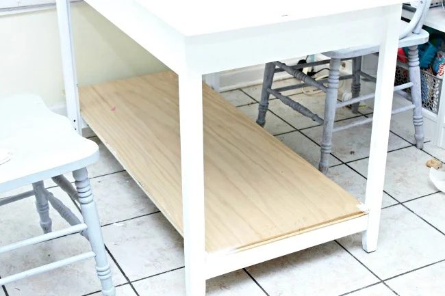 Bottom shelf on desk