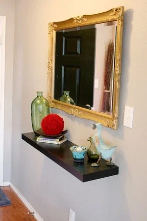 Entry updates black door white moldings entry table columns (17)