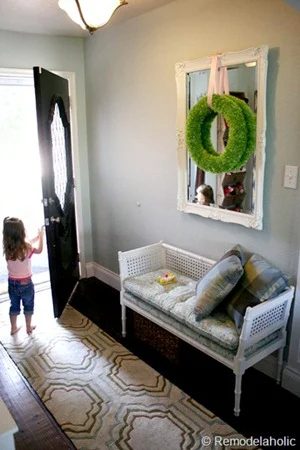Entry updates black door white moldings entry table columns (19)
