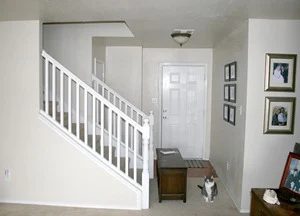 Entry updates black door white moldings entry table columns (15)