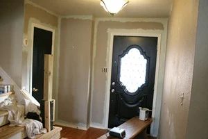 Entry updates black door white moldings entry table columns (26)