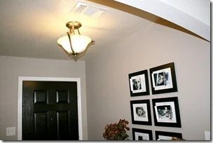Entry updates black door white moldings entry table columns (8)
