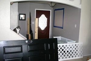 Entry updates black door white moldings entry table columns (9)