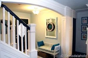 Entry updates black door white moldings entry table columns (27)
