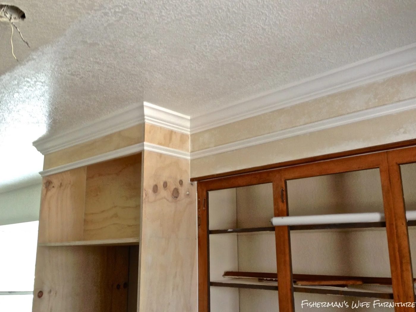small kitchen remodel - add molding to fridge enclosure and cabinets, Fisherman's Wife Furniture featured on Bekob.com