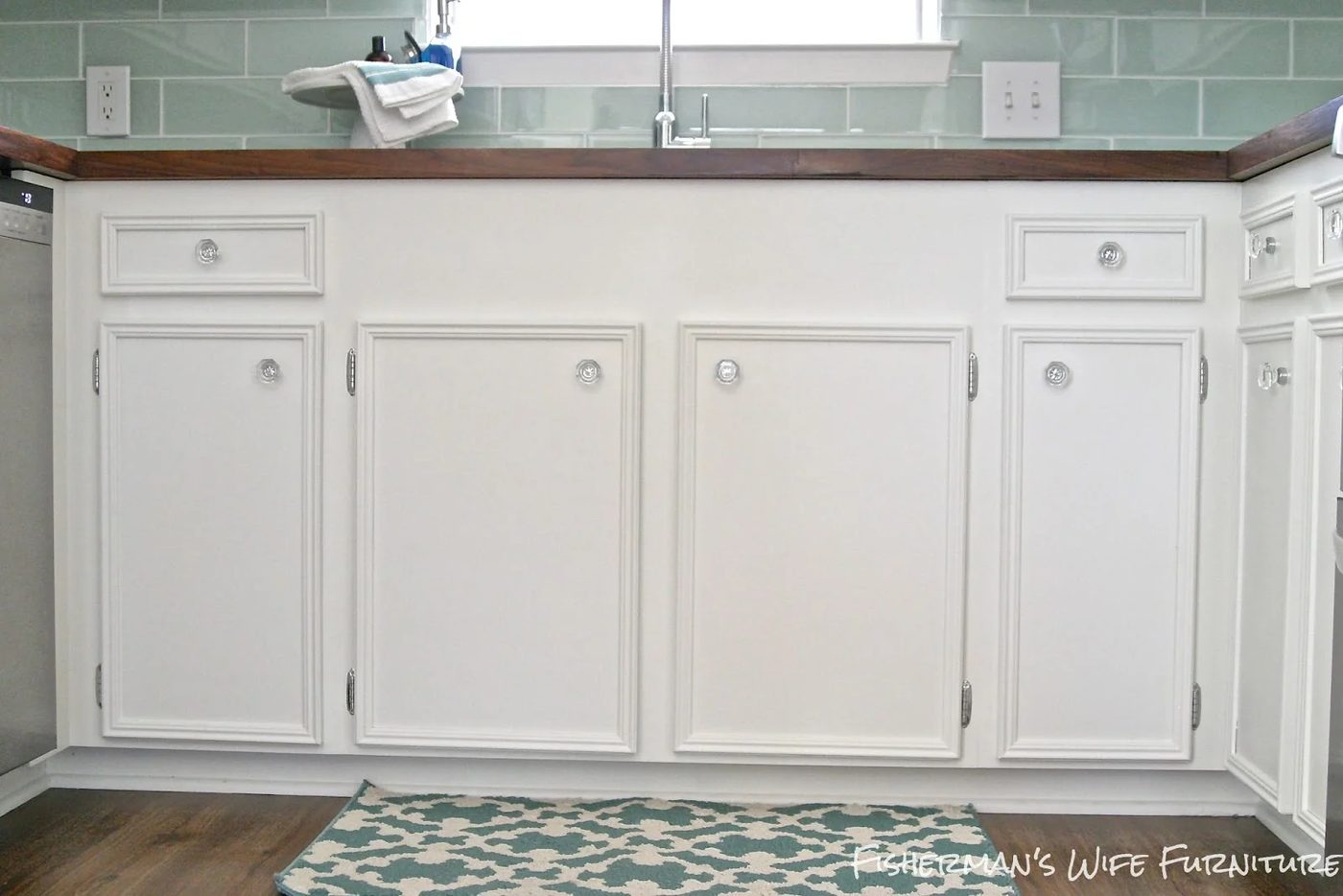 undermount sink front with white cabinets and glass knobs, Fisherman's Wife Furniture featured on Bekob.com