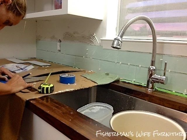 installing glass subway tile backsplash in small kitchen remodel, Fisherman's Wife Furniture featured on Bekob.com