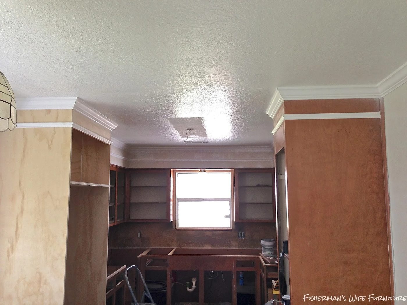 small kitchen remodel - add molding to fridge enclosure, Fisherman's Wife Furniture featured on Bekob.com