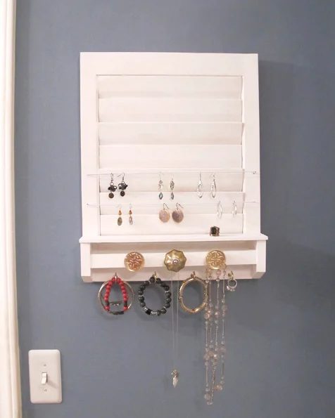 old shutter repurposed into jewelry holder White Tulip Designs