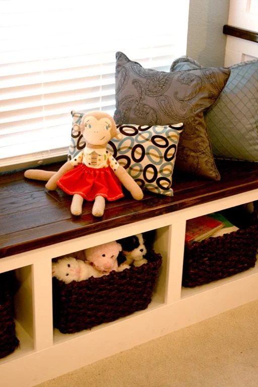 great wall of built-ins with toy storage bench and cupboards, Bekob