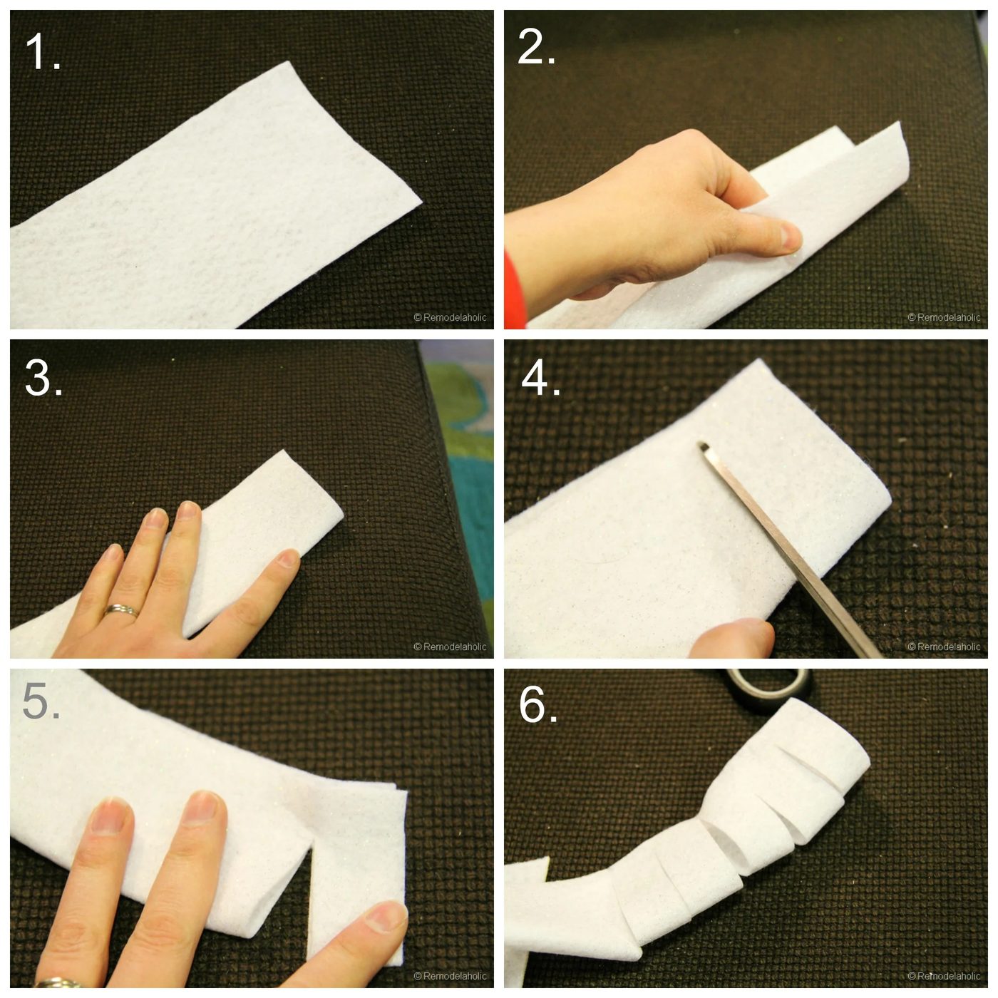 Cutting the felt for a snowman wreath by Bekob