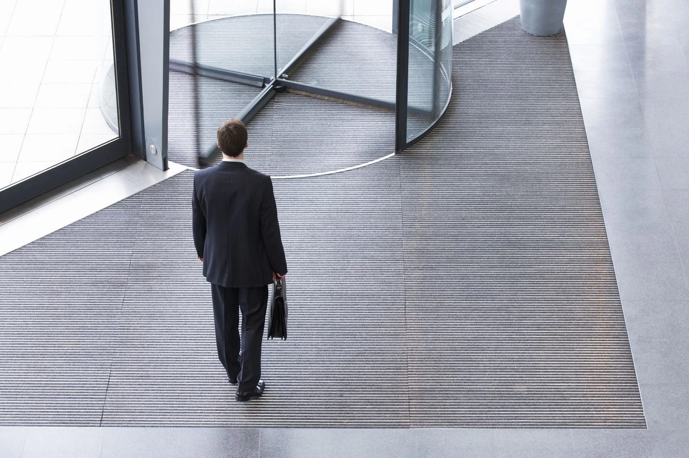 Man Going Inside The Building