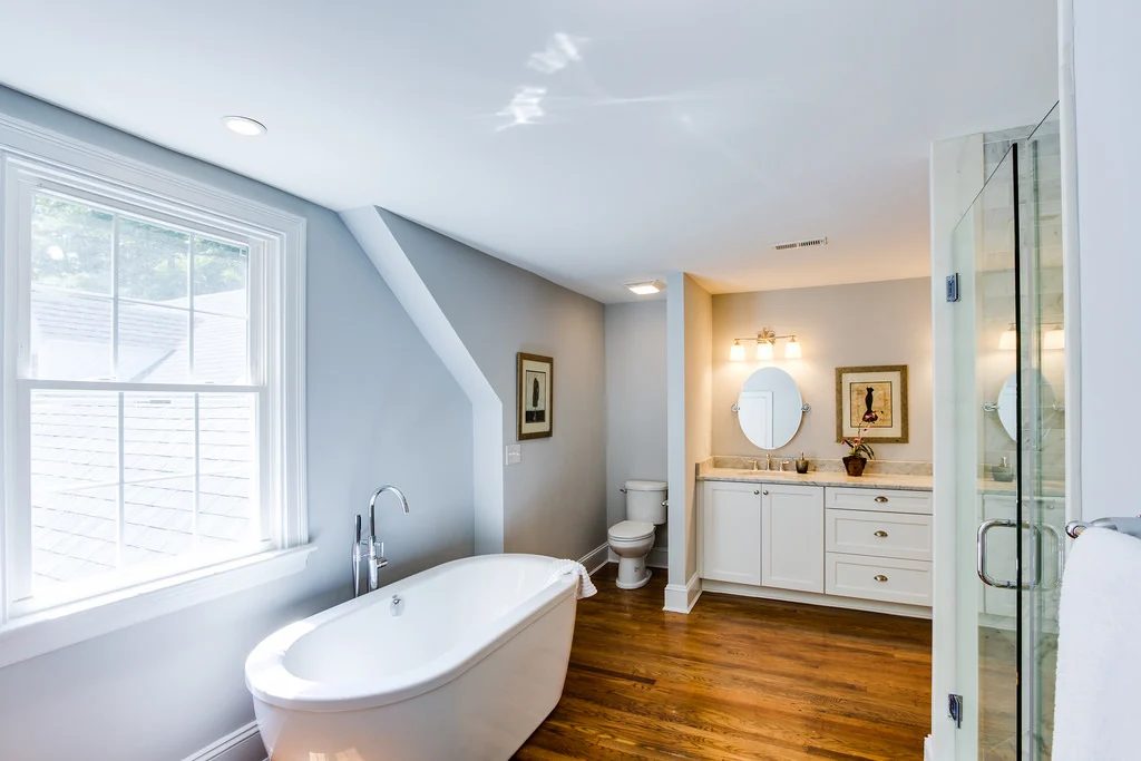 (Old Springs) bright and airy large bathroom renovation with salvaged wood floor @Bekob