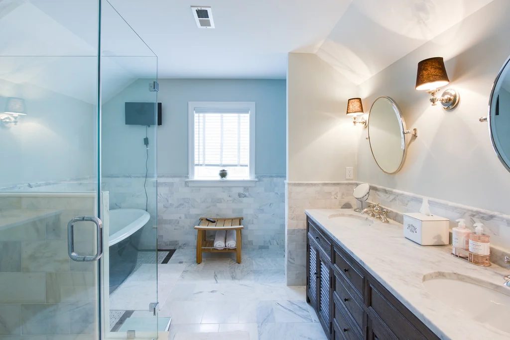 (Coventry) large white bathroom with marble and dark double vanity and mirrors @Bekob