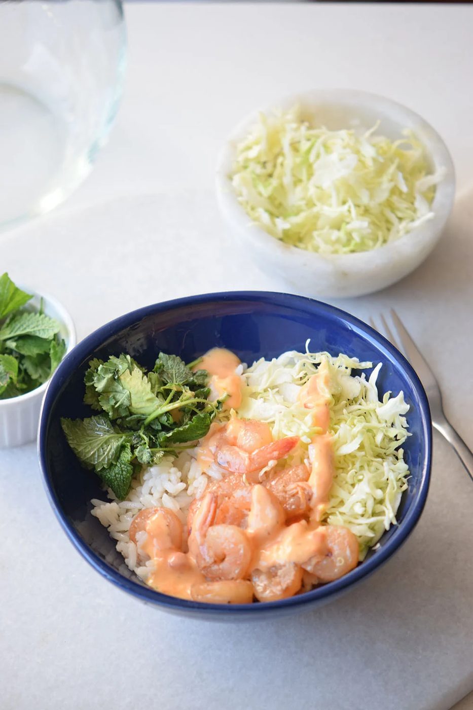 Looking for a yummy and straightforward recipe? Try this spicy shrimp bowl via Bekob.com