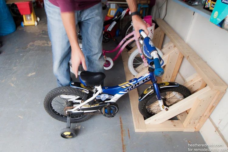 straightforward Handmade bike rack walkthrough to organize your garage NOW! Bekob.com via heatherednest.com