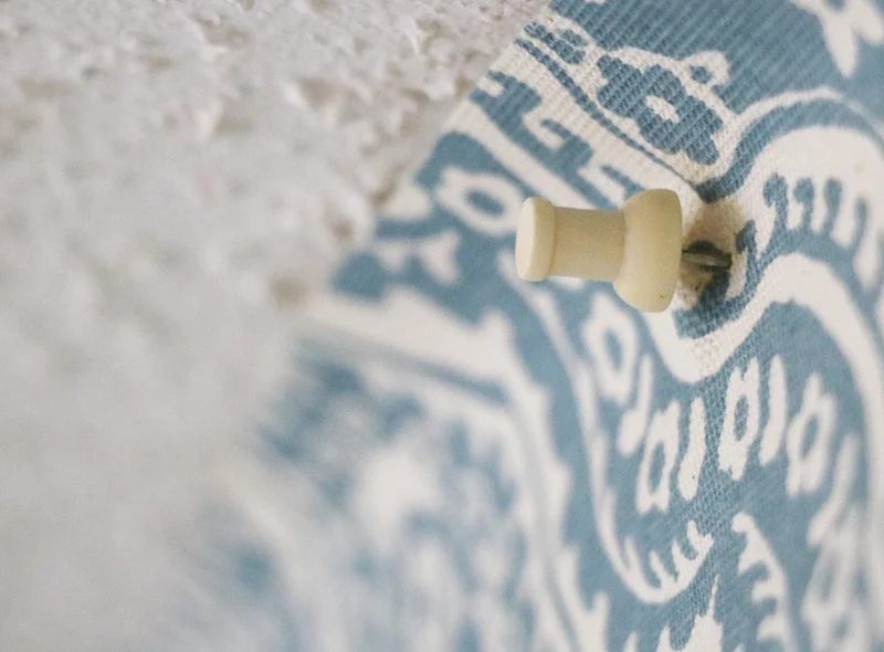 Using Tacks on Starched Fabric Wall