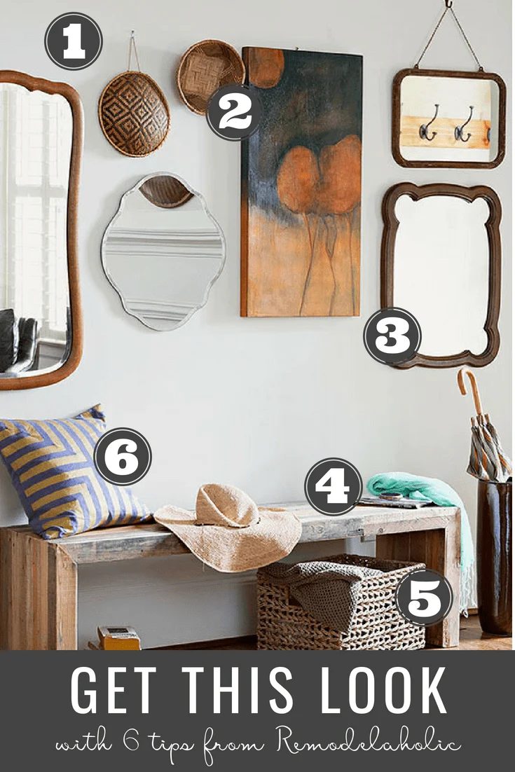 Entry With Several Mirrors Of A Variety Of Shapes And Sizes, In A Collage, Art Work, Bench, Pillow On Top, Wicker Basket Beneath
