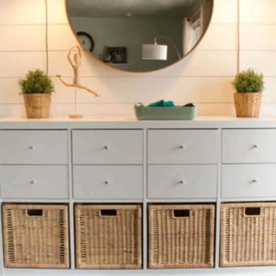 Organizing Your Entryway White Drawers With Wicker Baskets And Shiplap Wall Behind