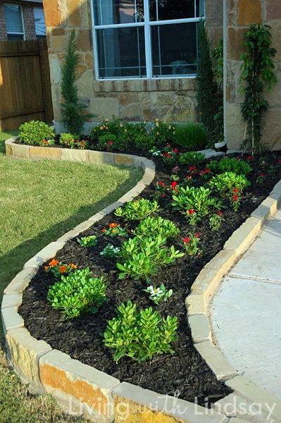 Brick pavers for a tall garden edge and lots of other pretty ways to edge a garden featured on Bekob.com