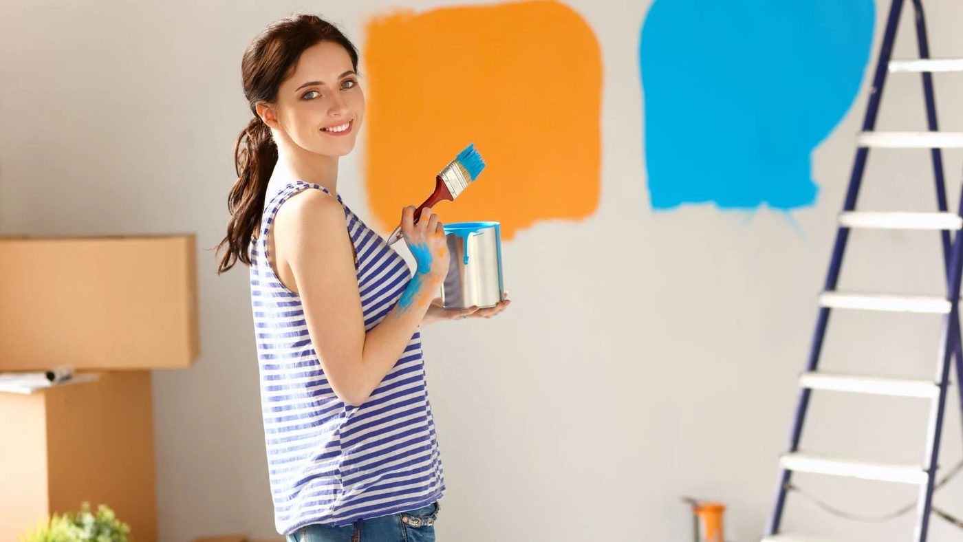Woman Painting Wall