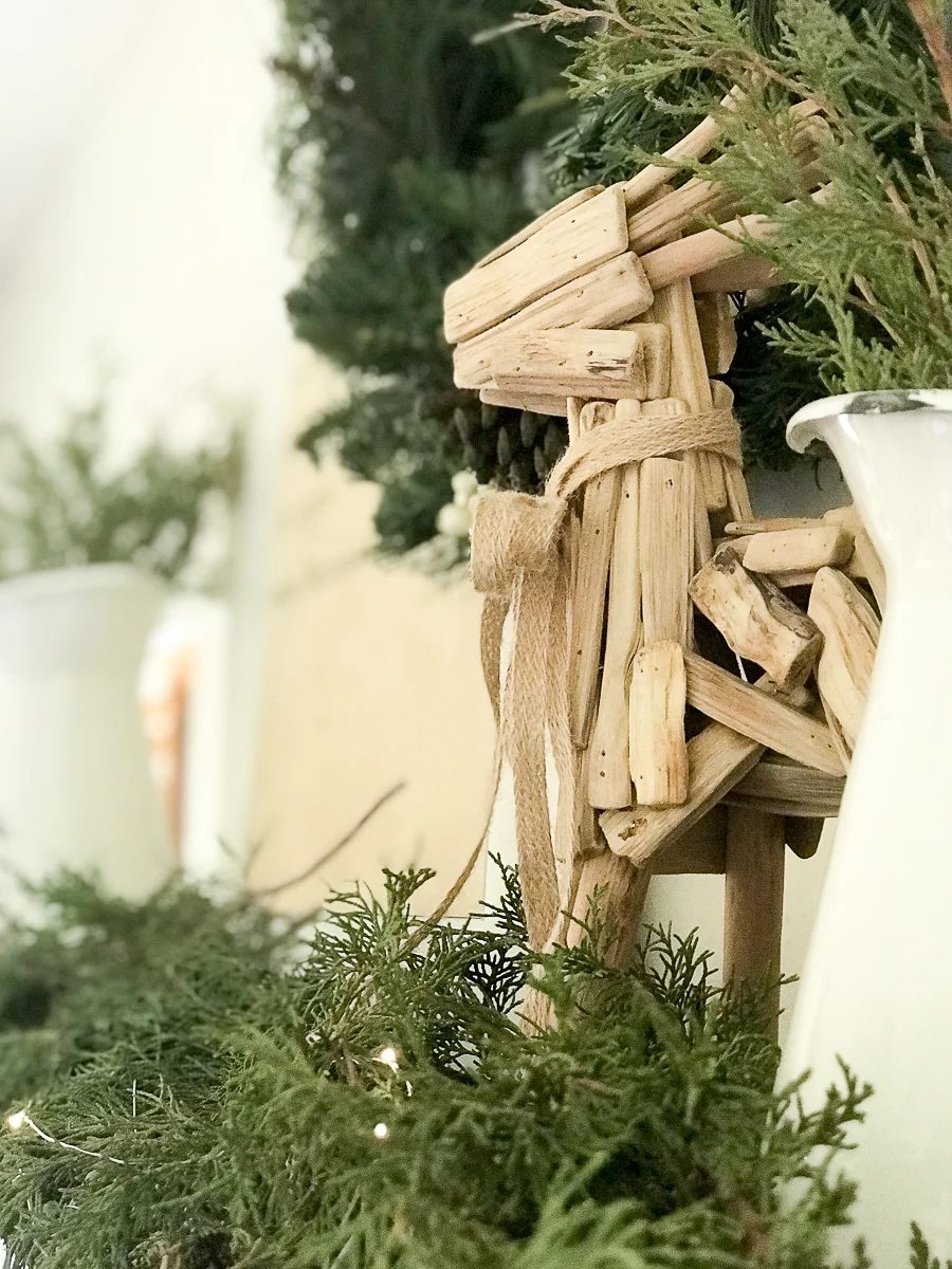 Create the perfectly styled farmhouse Christmas mantel this year with these helpful tips and tricks to creating a striking space.