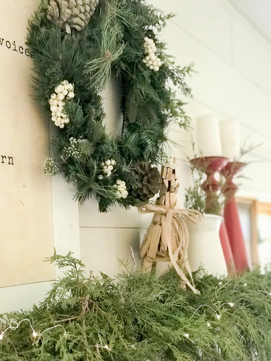 Create the perfectly styled farmhouse Christmas mantel this year with these helpful tips and tricks to creating a striking space.