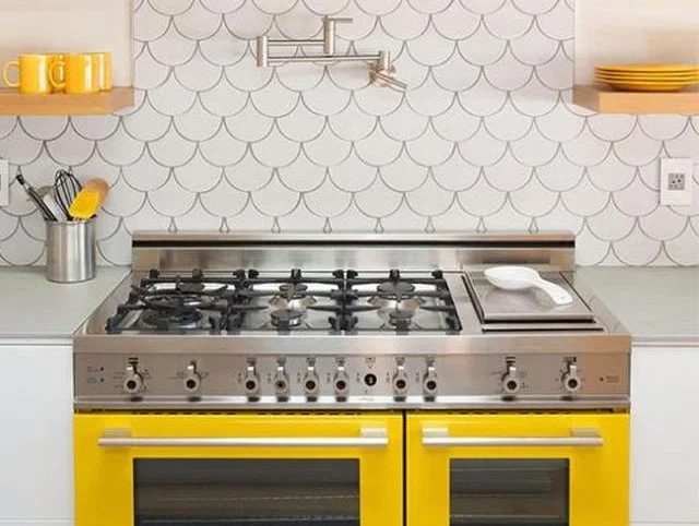Yellow Kitchen Stove and Accents via Gia Renovations | How to decorate with sunny yellow | Yellow Kitchen Inspiration #Bekob