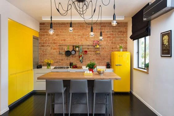 Sunny yellow kitchen accent wall and fridge with exposed brick wall, modern kitchen | Yellow Kitchen Inspiration #Bekob