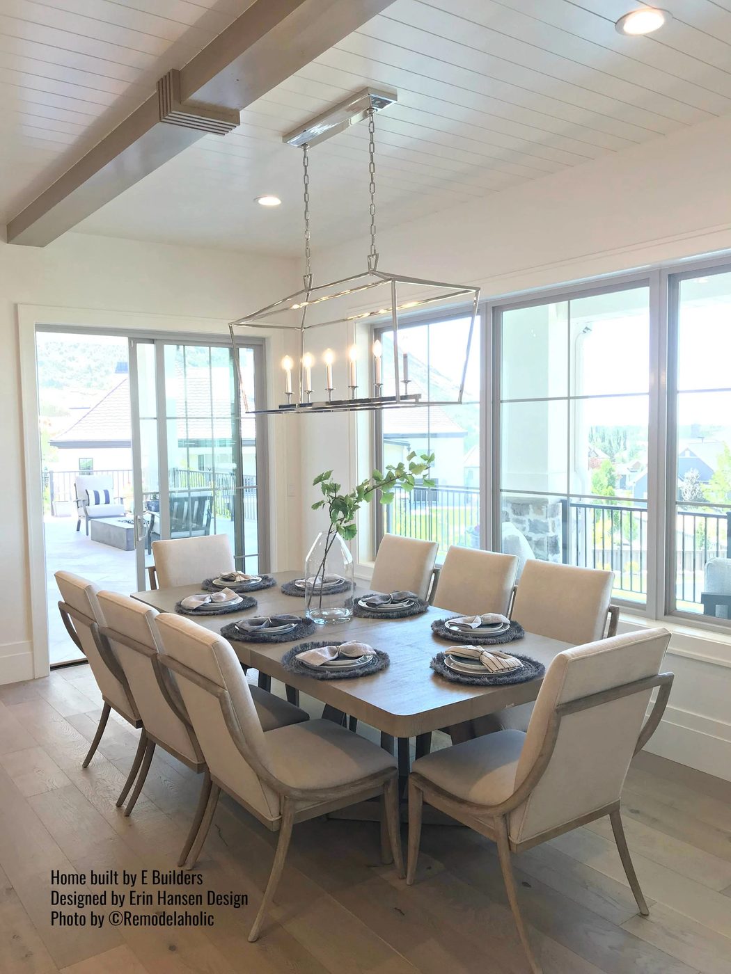 Transitional Home Dining Room with modern table and chairs