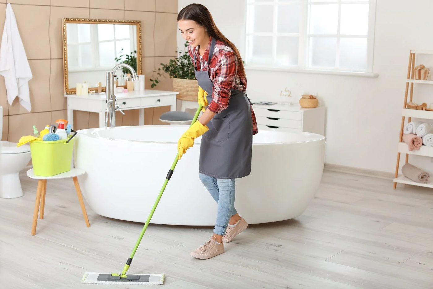 Woman Cleaning Bathroom