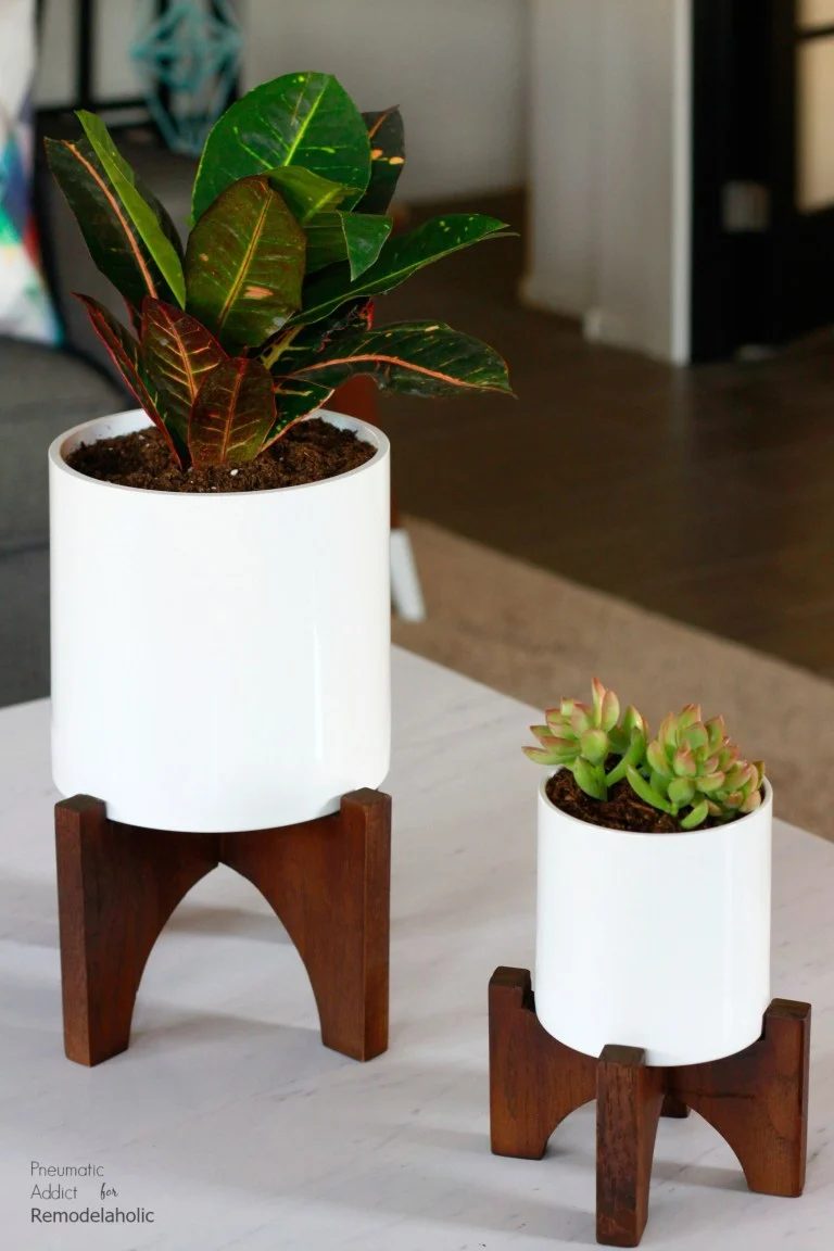 Stained Wood Planters With White Pots And Succulents