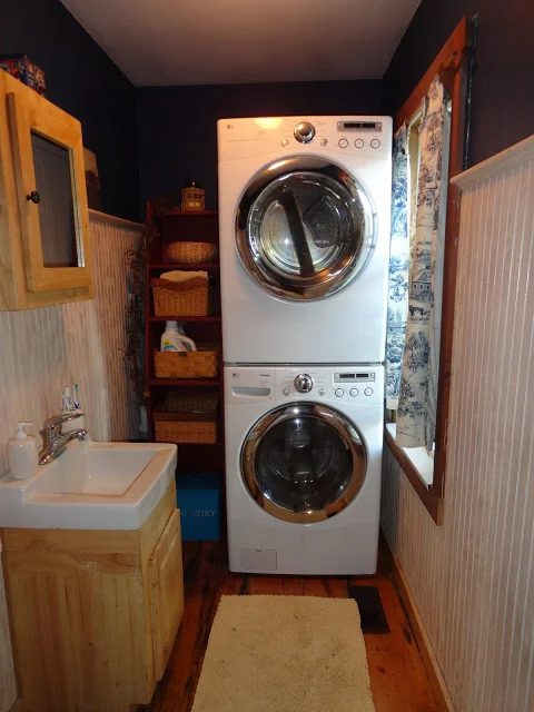 half bath and tiny laundry space with stacked washer and dryer, The Long Awaited Home