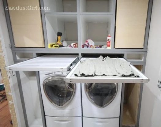 small laundry room - handmade pull-out sweater drying rack, Sawdust Girl