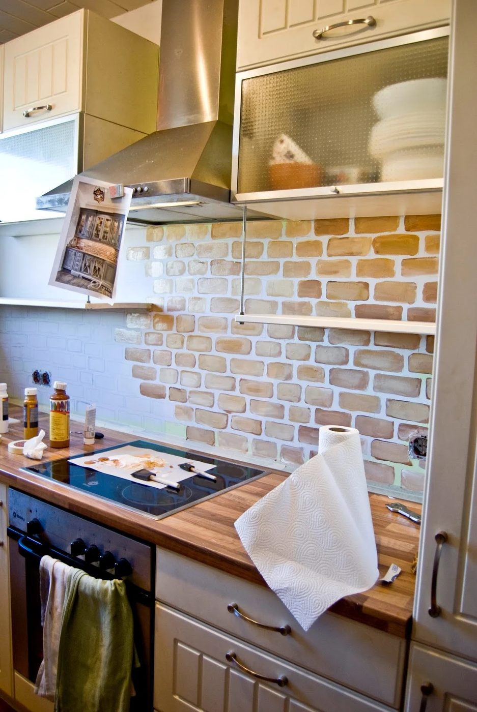small kitchen with painted faux brick backsplash - Pudel-design featured on @Bekob