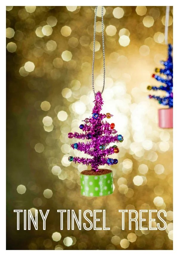 Small tannenbaums with bold colors and lots of sparkle have a big impact on a tree. Love a good tinsel tree? Create some tiny tinsel trees using metallic pipe cleaners. Keep the ki